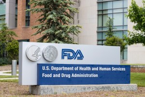 Exterior sign of the U.S. Food and Drug Administration (FDA) headquarters, symbolizing regulatory authority over drug approvals and biotech development.