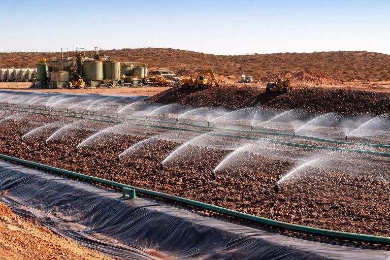 Pacgold (ASX: PGO) has begun heap leach irrigation at the White Dam Gold Project, with up to 250,000 tonnes of ore under treatment by mid-January 2026 and initial gold sales expected soon. Drilling and pad expansion studies are underway.